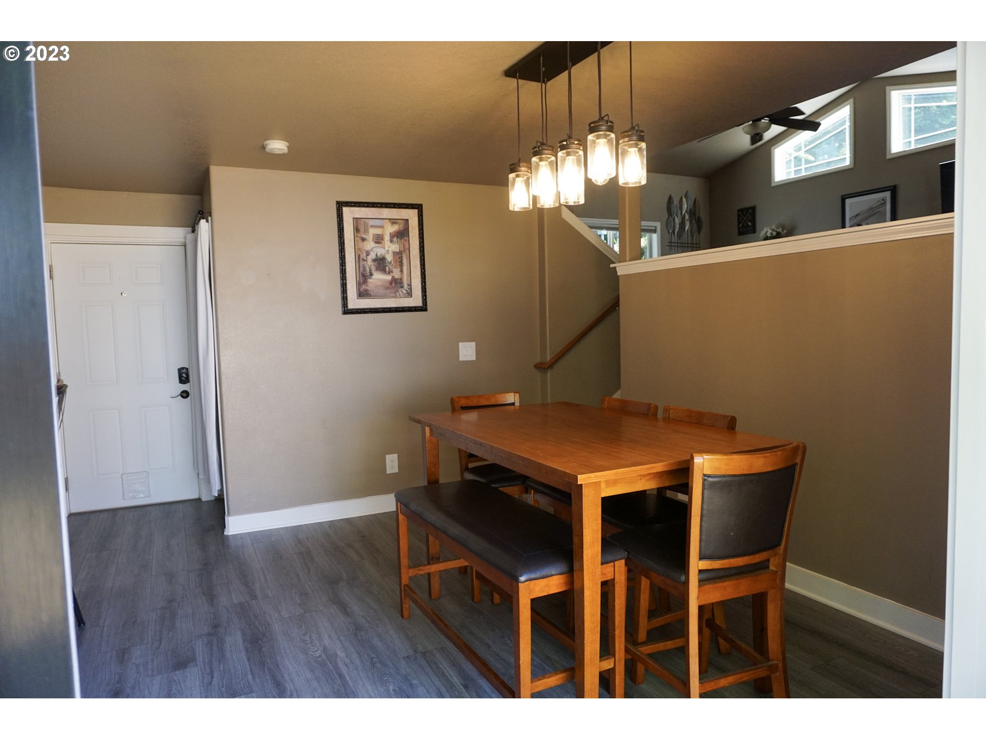 828 South 73rd Street Springfield, OR 97478 - Photo 8 of 23 a view of a dining room with furniture and chandelier