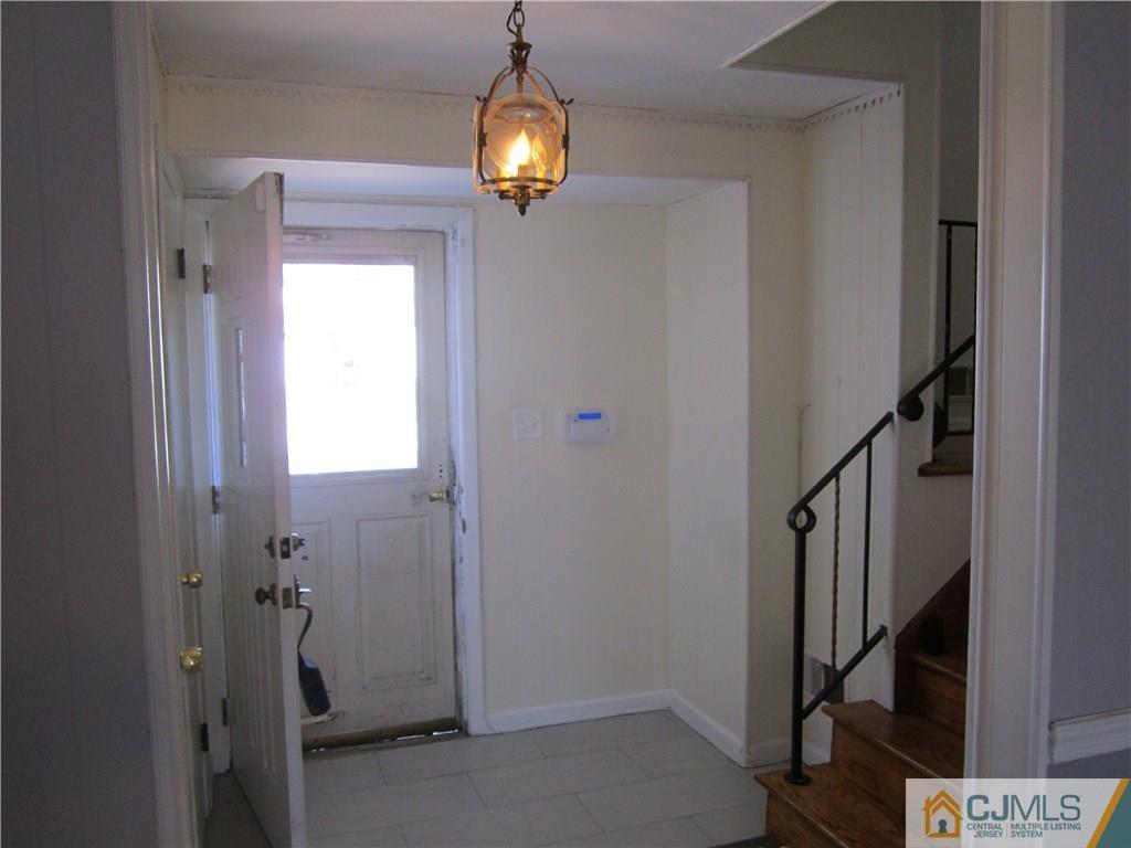 26 Outcalt Road Edison, NJ 08817 - Photo 16 of 23 a view of an entryway with a livingroom