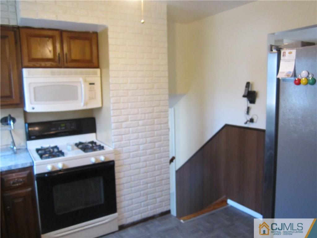 26 Outcalt Road Edison, NJ 08817 - Photo 6 of 23 a bathroom with a sink and a mirror