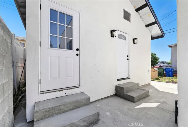 a view of a livingroom with an empty space and a window