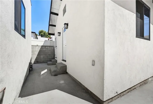 a hallway with seating area