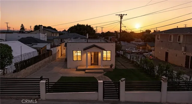 a view of a house with a street