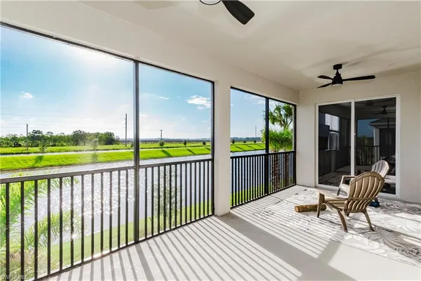 a view of a balcony with wooden floor