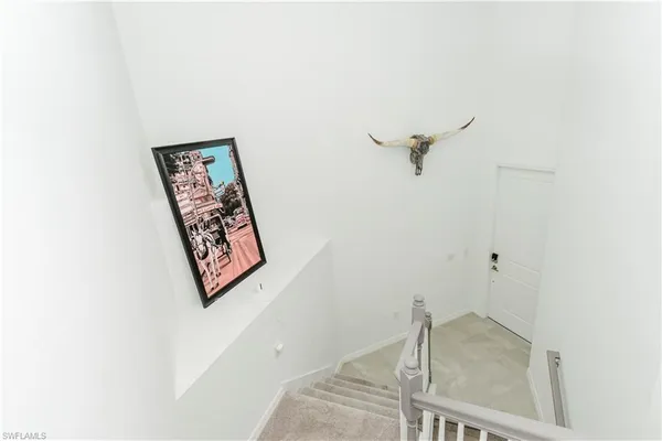 a bathroom with a shower and a sink
