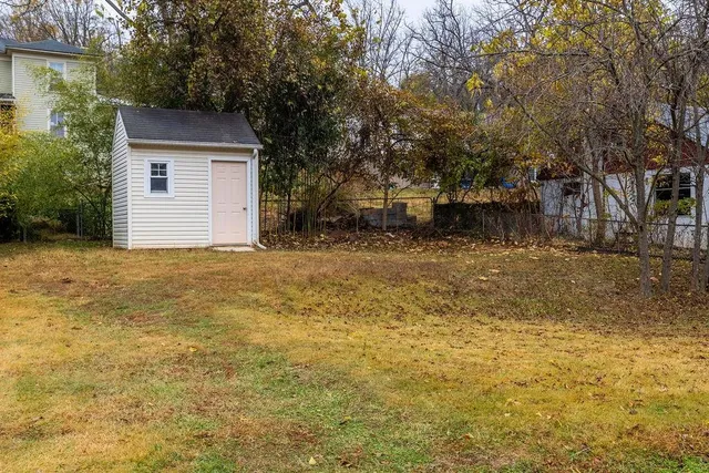 a view of a yard with a house
