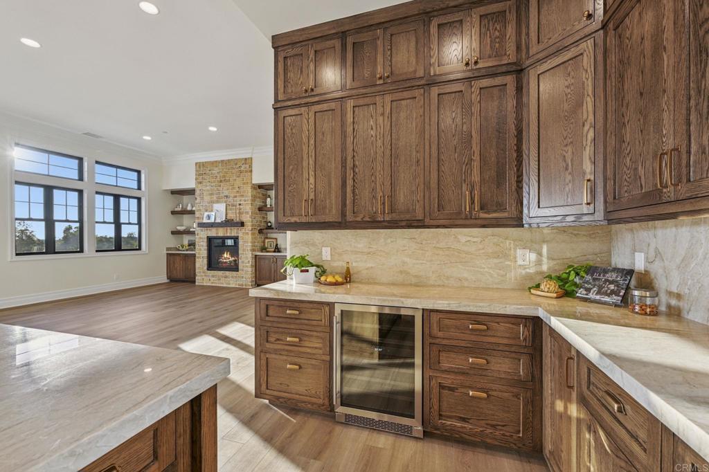 662 Lower Springs Road Fallbrook, CA 92028 - Photo 14 of 72 a kitchen with stainless steel appliances granite countertop a sink stove and cabinets