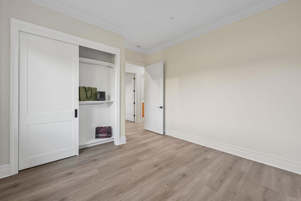 662 Lower Springs Road Fallbrook, CA 92028 - Photo 32 of 72 a view of empty room with wooden floor