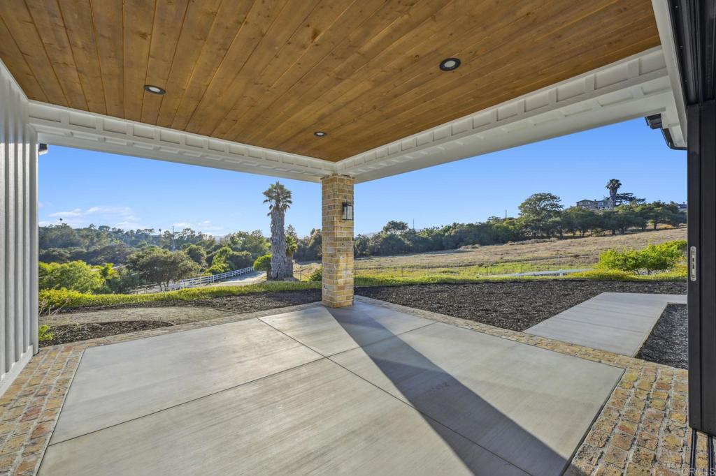 662 Lower Springs Road Fallbrook, CA 92028 - Photo 36 of 72 a view of a swimming pool and outdoor space