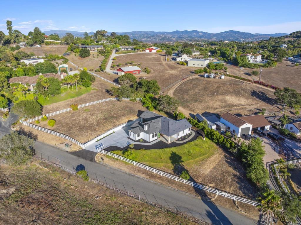 662 Lower Springs Road Fallbrook, CA 92028 - Photo 47 of 72 an aerial view of residential houses with outdoor space
