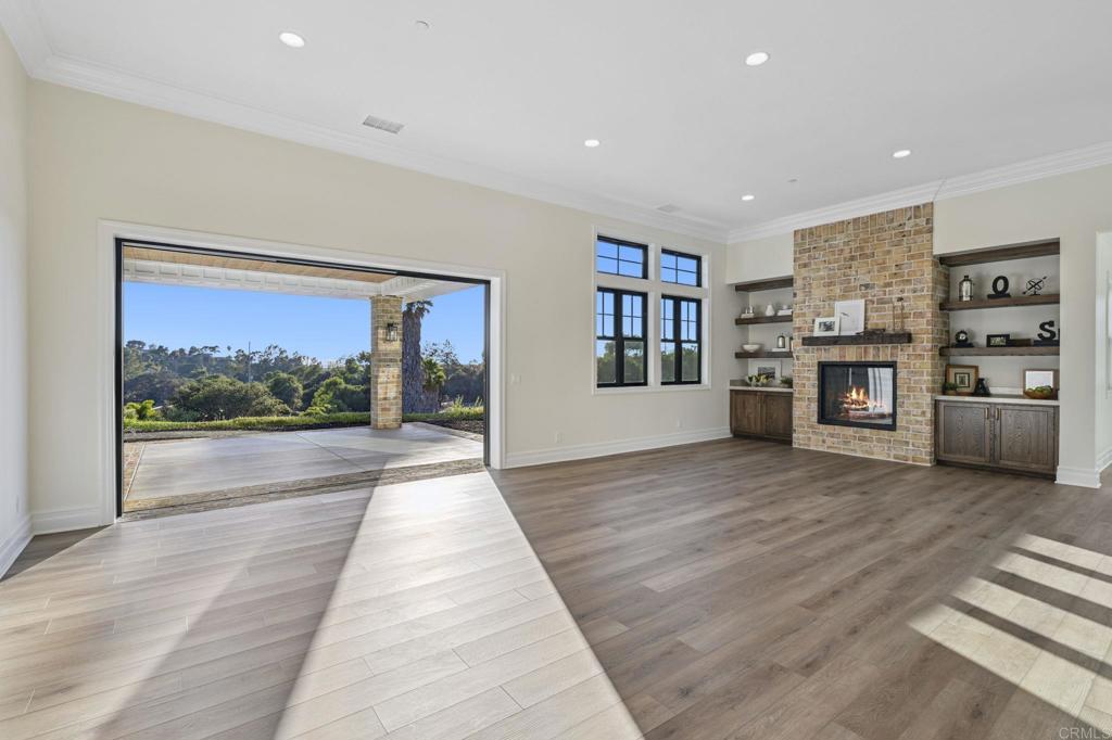 662 Lower Springs Road Fallbrook, CA 92028 - Photo 5 of 72 a view of a living room a window and a fireplace