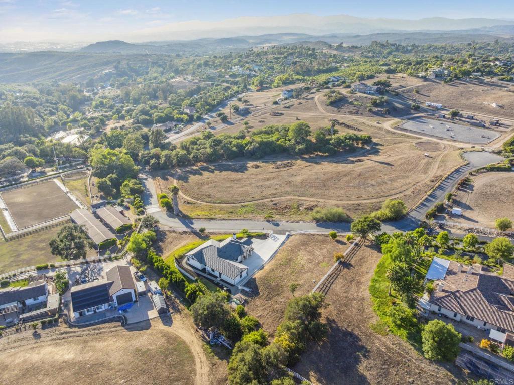 662 Lower Springs Road Fallbrook, CA 92028 - Photo 51 of 72 an aerial view of a house with a mountain