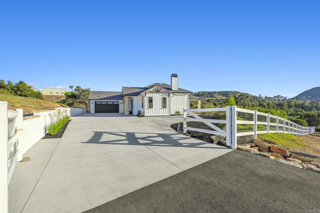 662 Lower Springs Road Fallbrook, CA 92028 - Photo 54 of 72 a view of a house with a road