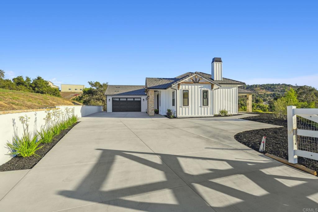 662 Lower Springs Road Fallbrook, CA 92028 - Photo 55 of 72 a front view of a house with a yard