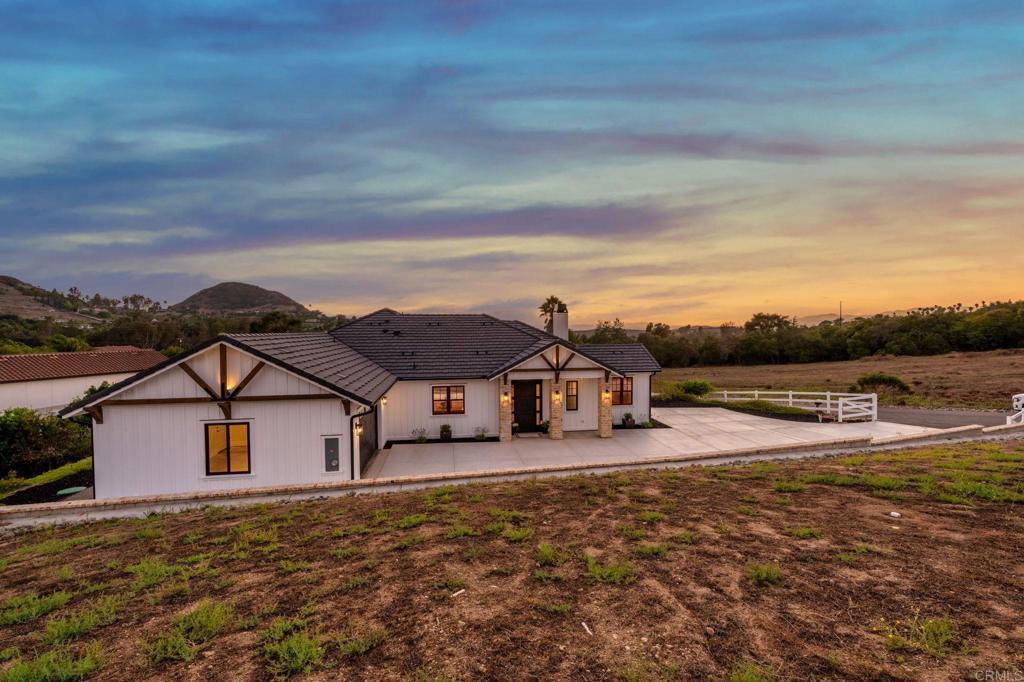 662 Lower Springs Road Fallbrook, CA 92028 - Photo 60 of 72 a view of a house with a yard and lake view