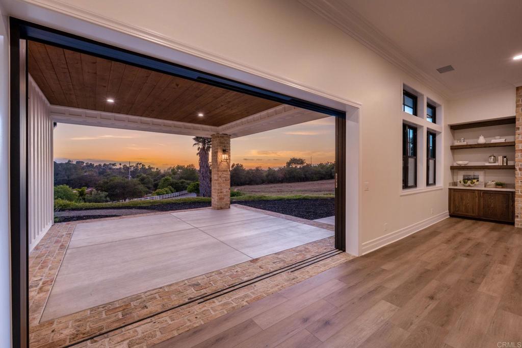 662 Lower Springs Road Fallbrook, CA 92028 - Photo 68 of 72 a view of a living room and a floor to ceiling window
