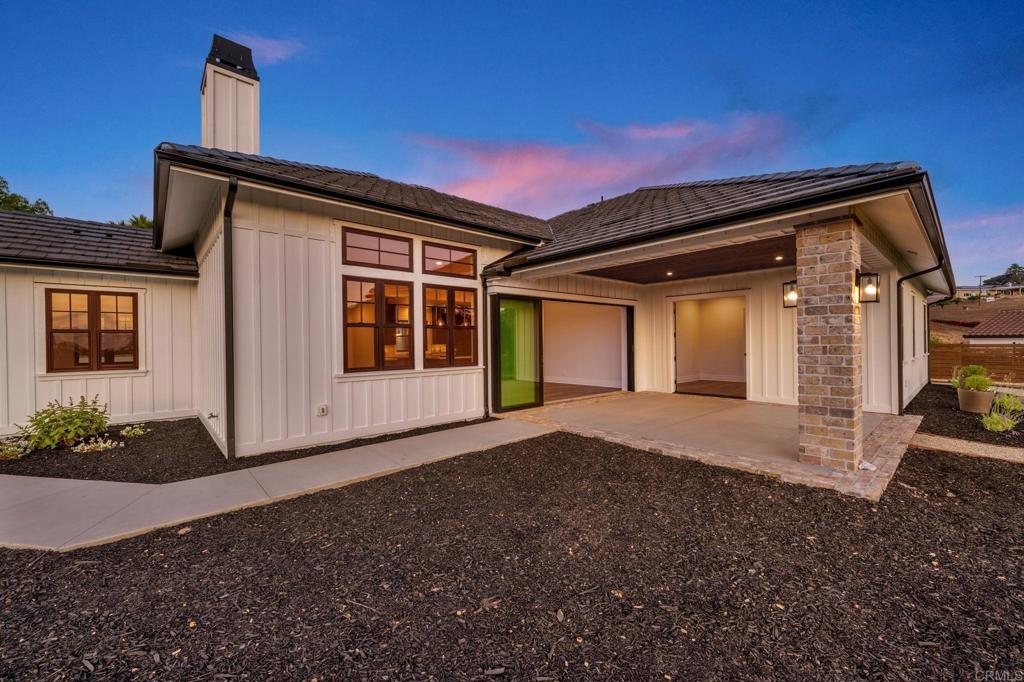 662 Lower Springs Road Fallbrook, CA 92028 - Photo 69 of 72 a view of house with backyard and glass windows