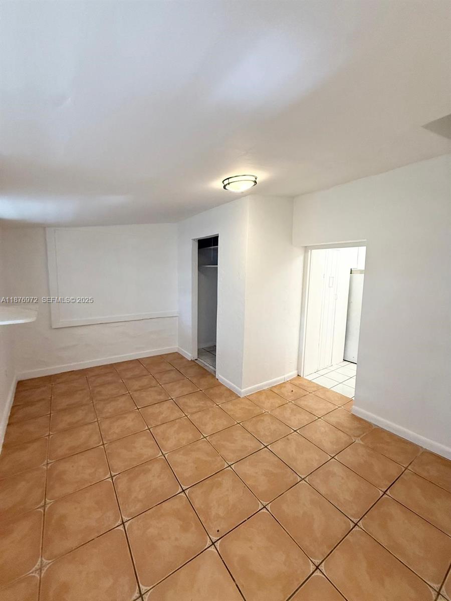1340 Peri Street, Unit D Opa-Locka, FL 33054 - Photo 5 of 6 a view of empty room