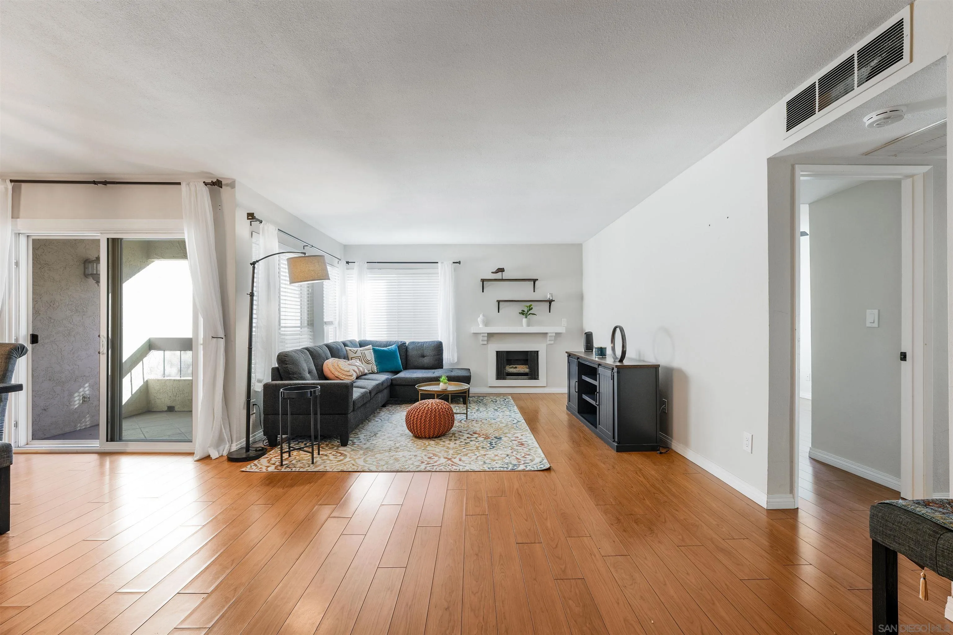 6747 Friars Road, Unit 113 San Diego, CA 92108 - Photo 2 of 48 a view of a living room and dining room