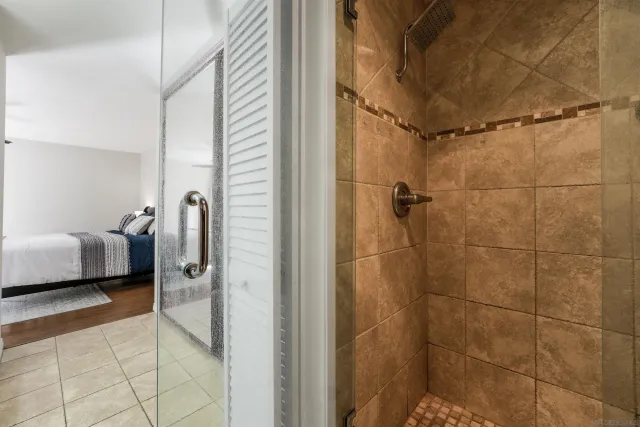 a bathroom with a sink and a shower