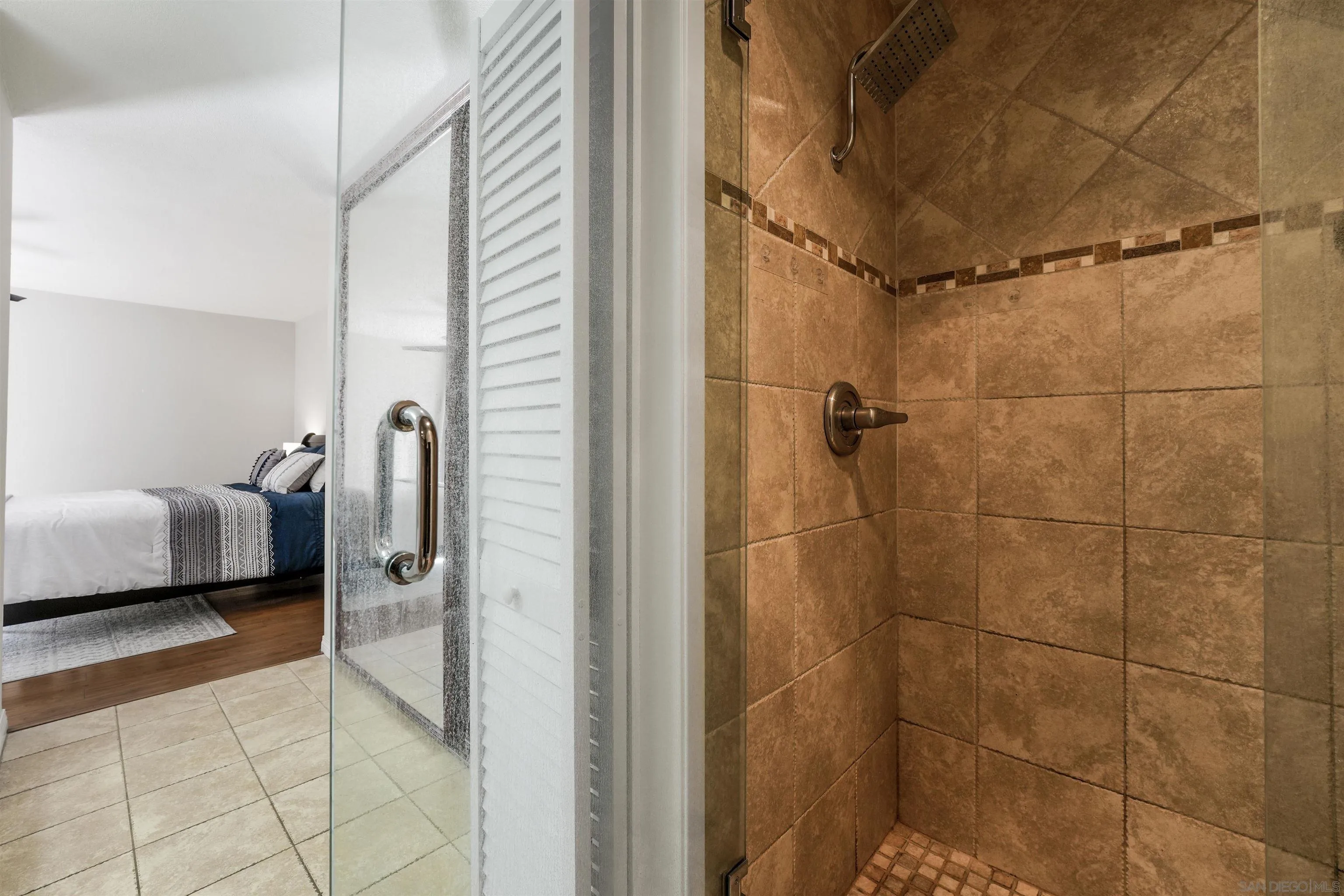 6747 Friars Road, Unit 113 San Diego, CA 92108 - Photo 29 of 48 a bathroom with a sink and a shower