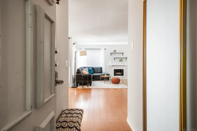 a view of living room with furniture and a window