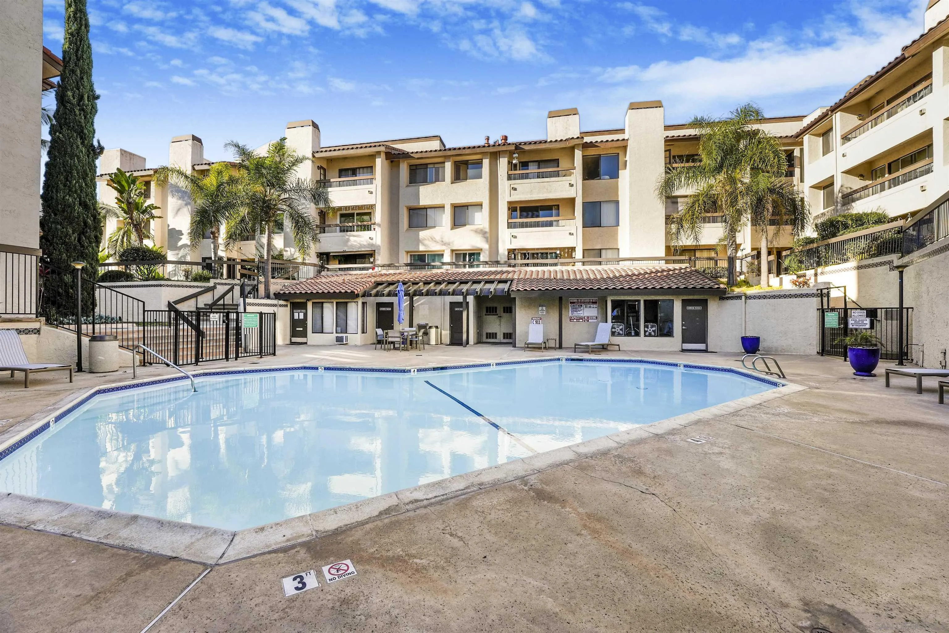 6747 Friars Road, Unit 113 San Diego, CA 92108 - Photo 36 of 48 a large building with a swimming pool