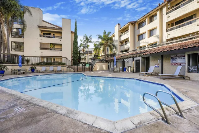 a view of a building with a swimming pool