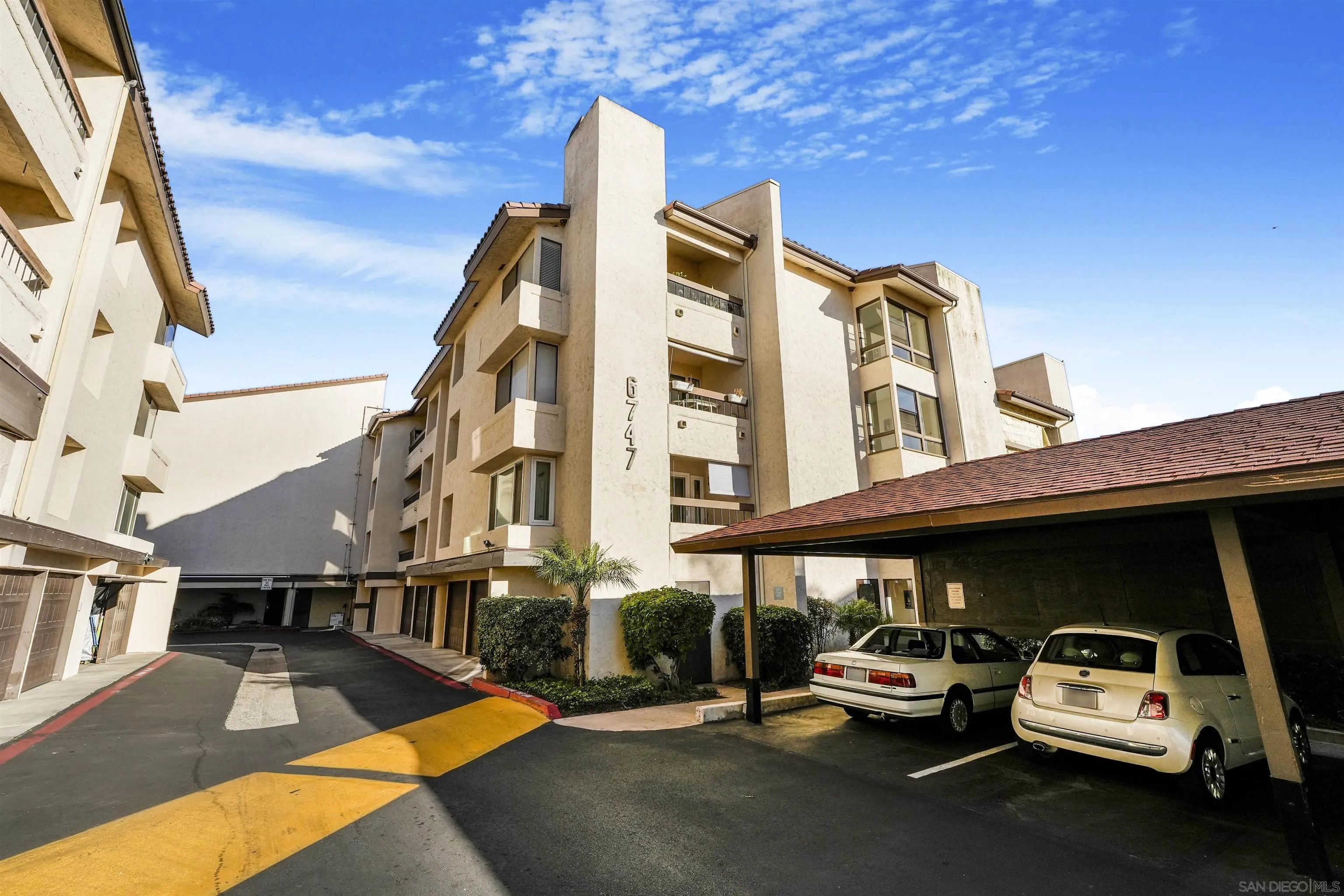 6747 Friars Road, Unit 113 San Diego, CA 92108 - Photo 42 of 48 a view of a car park in front of building