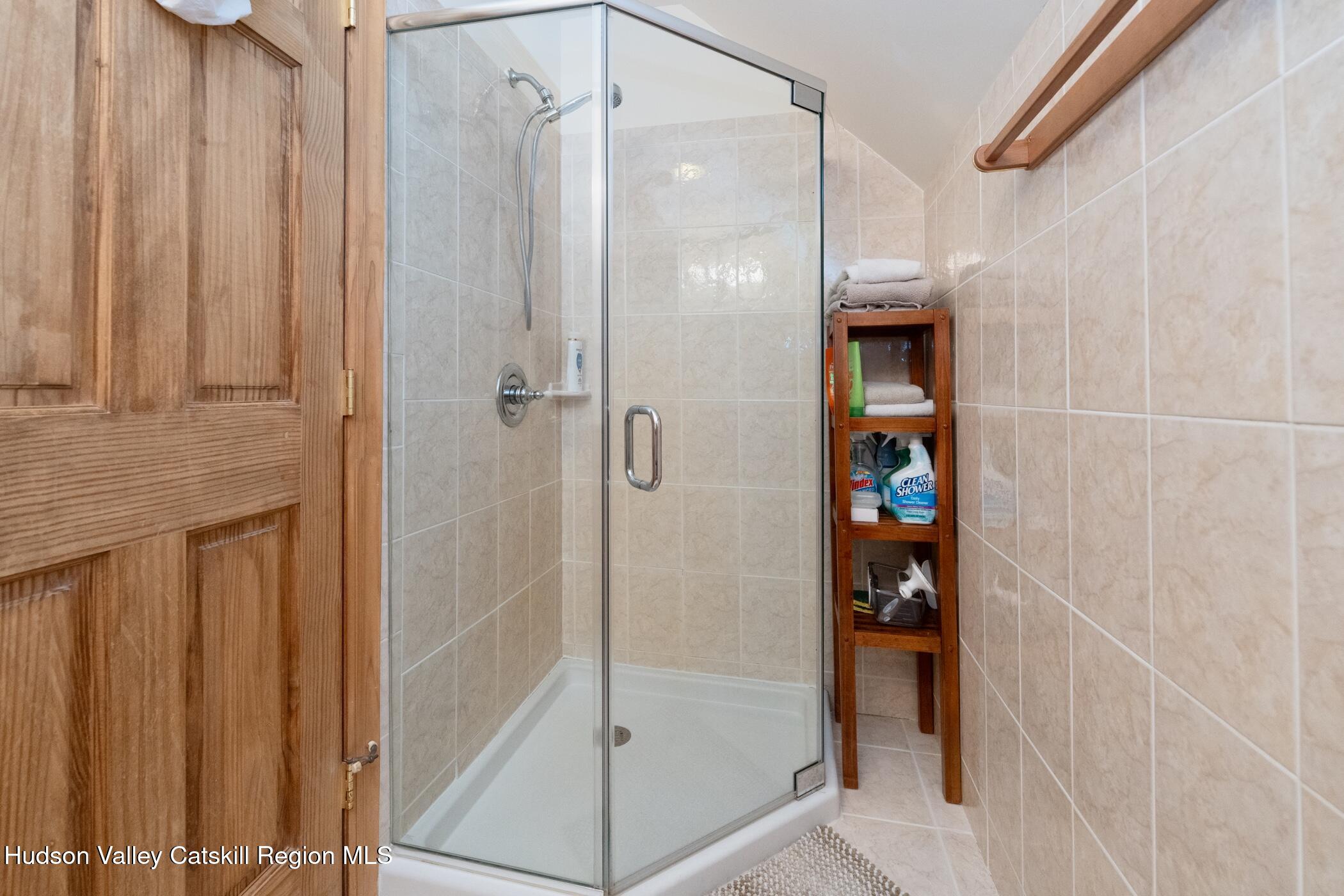 140 Stone Dock Road High Falls, NY 12440 - Photo 27 of 42 a bathroom with a glass shower door