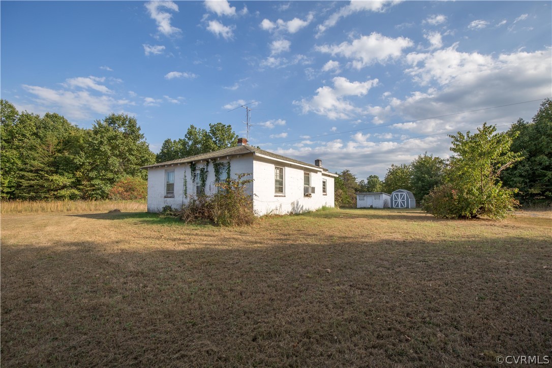1048 Shelton Store Road Wingina, VA 24599 - Photo 1 of 50 a view of a house with a big yard plants and trees