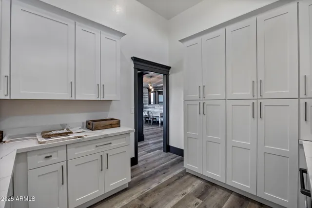 a bathroom with a sink double vanity and a mirror