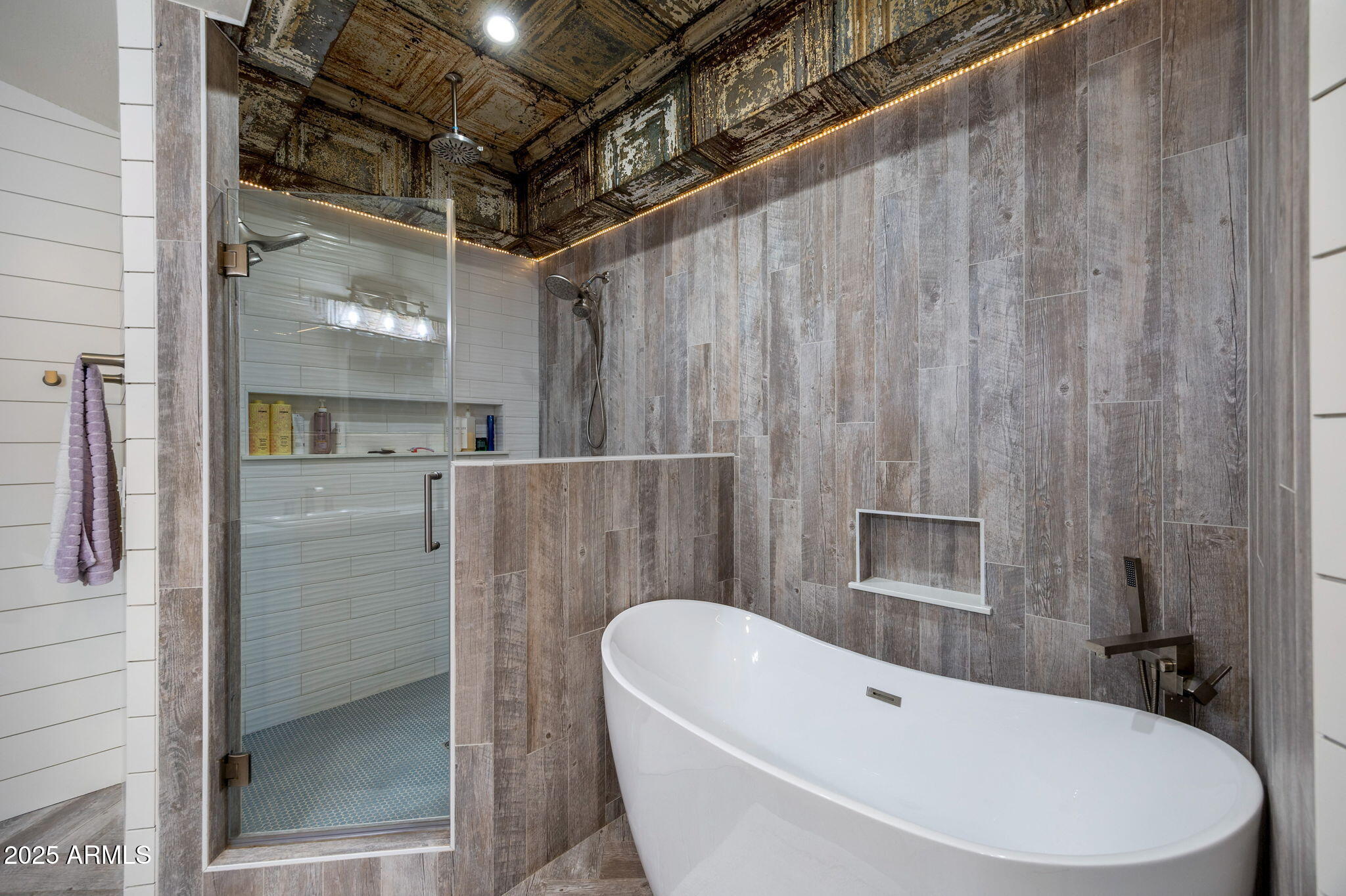 7106 Long Road Show Low, AZ 85901 - Photo 21 of 65 a bathroom with a white bath tub a shower and a sink
