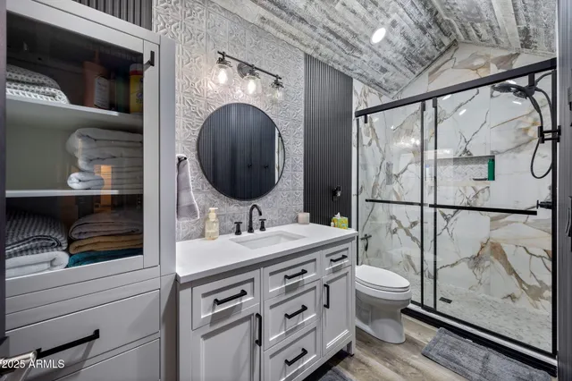 a view of a house with garden and patio