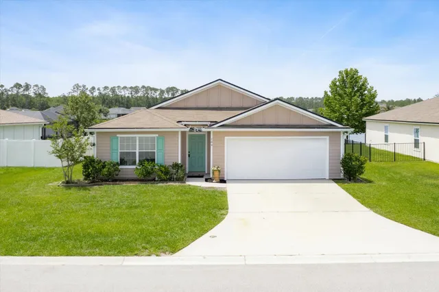 a view of a house with a swimming pool