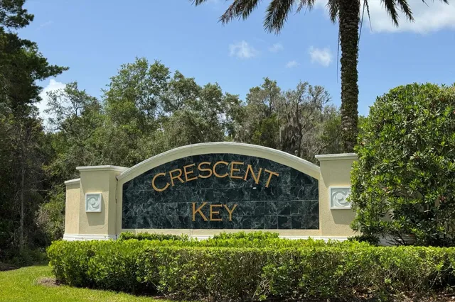 front view of a residential houses with a yard