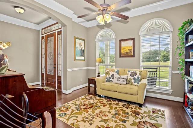 a living room with furniture and a window