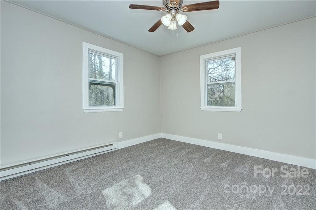 3128-3130 Ridge Avenue Charlotte, NC 28208 - Photo 9 of 22 a view of an empty room with a window