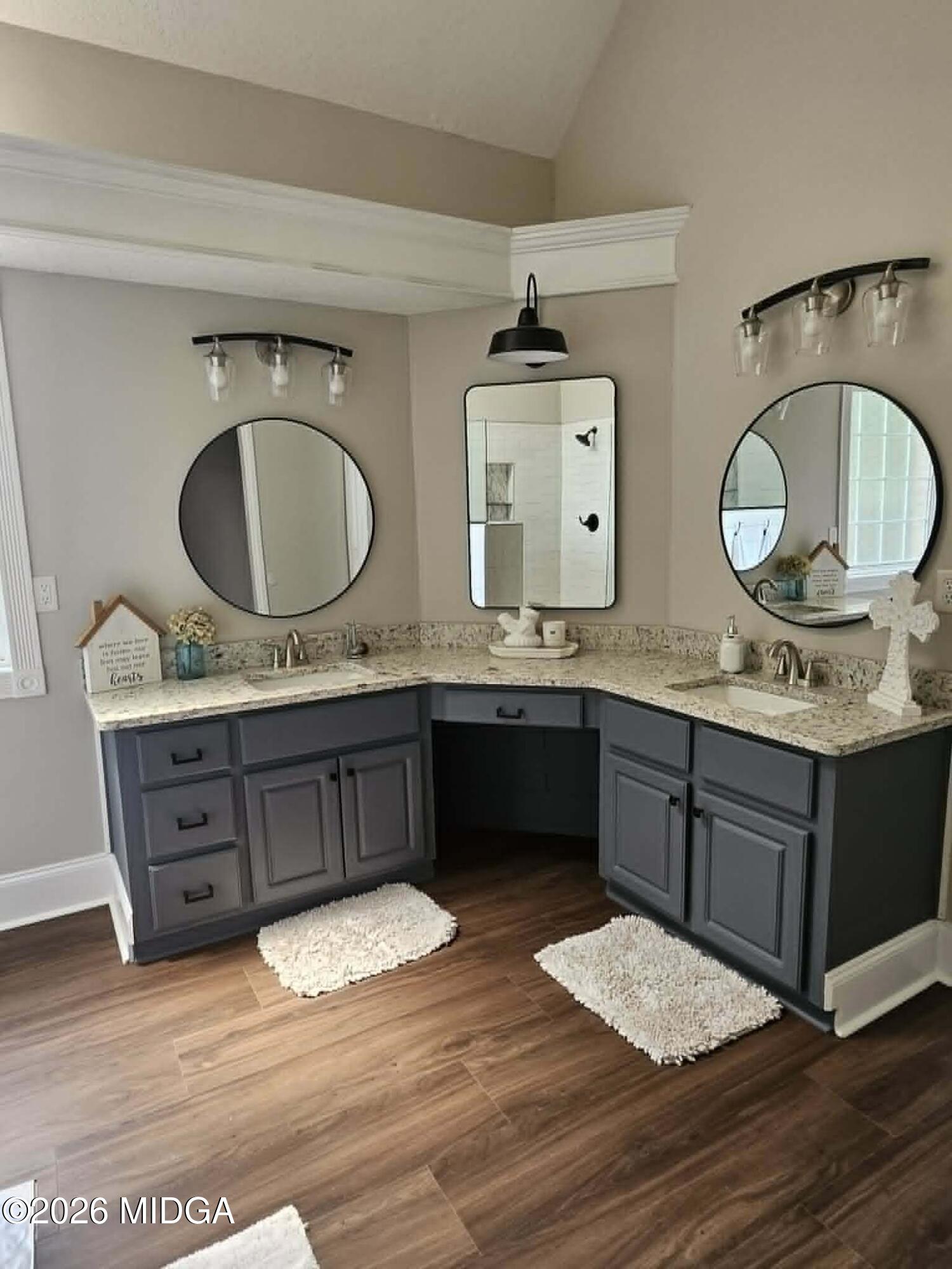 214 Tivoli Park Road Centerville, GA 31028 - Photo 13 of 26 a bathroom with a granite countertop sink and a mirror