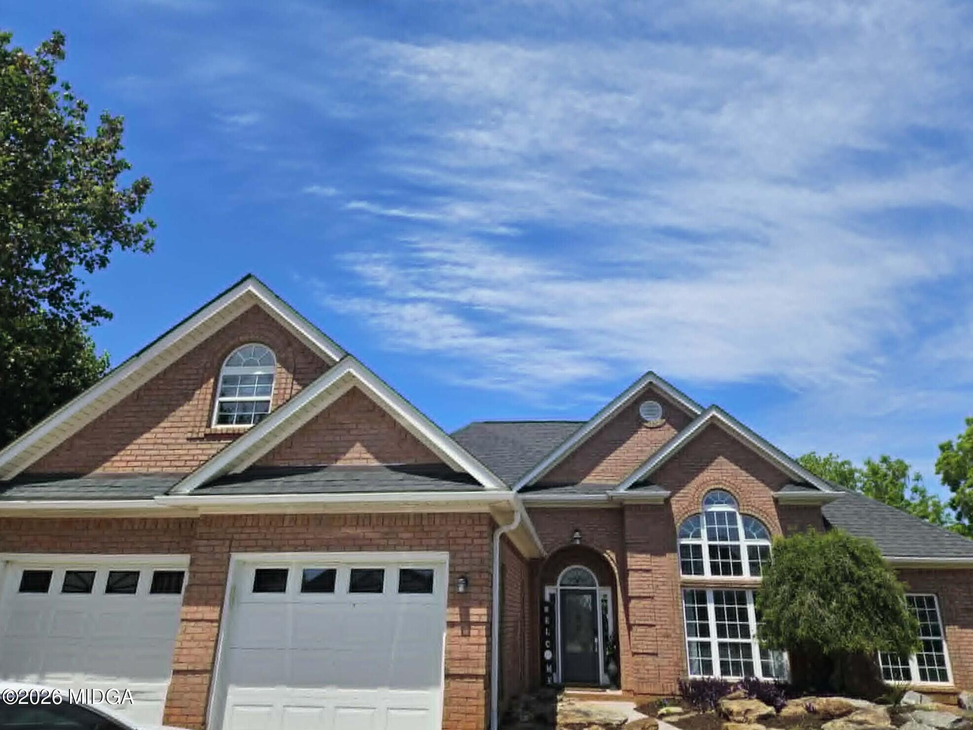 214 Tivoli Park Road Centerville, GA 31028 - Photo 17 of 26 a front view of a house with a yard