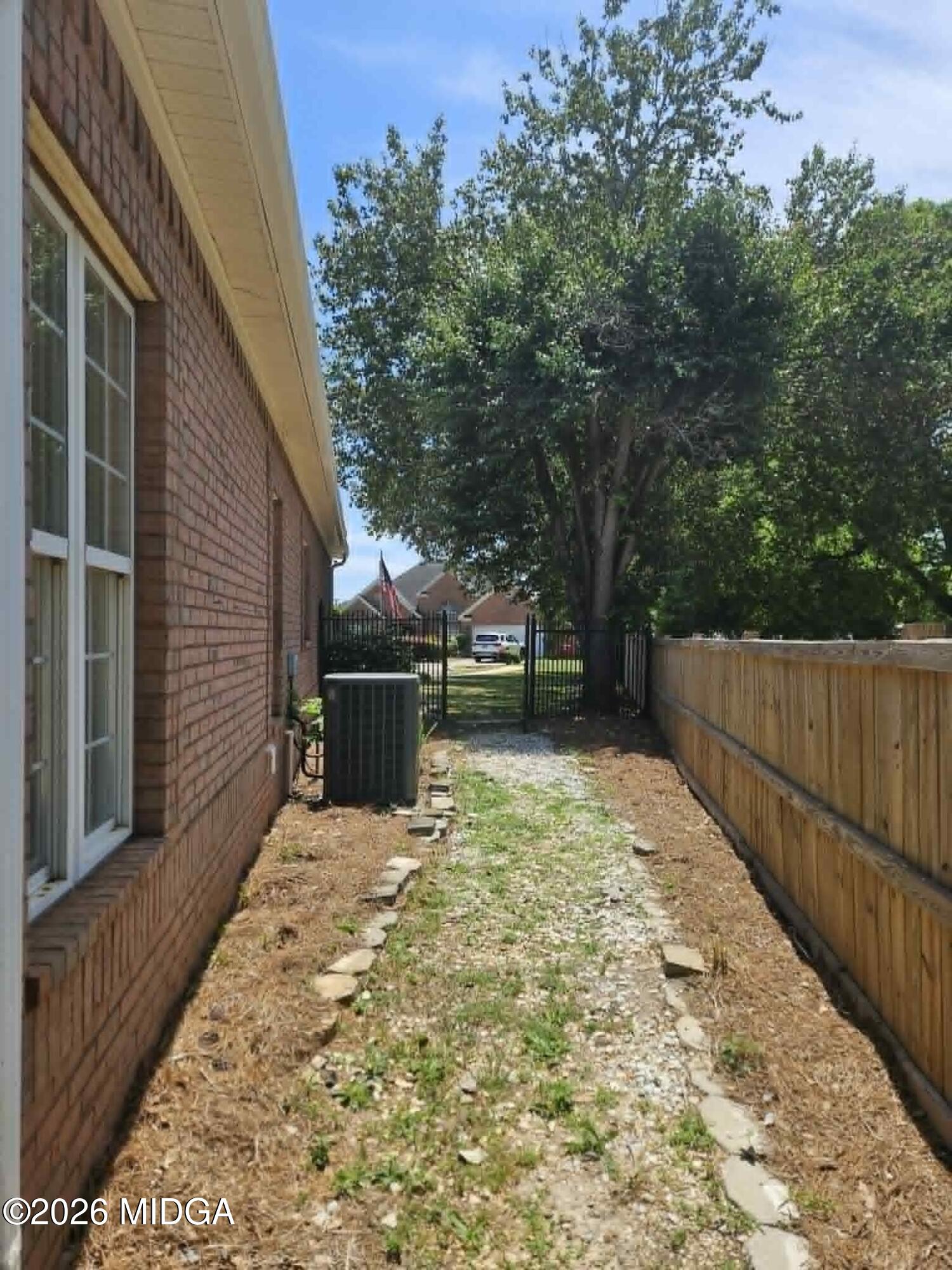 214 Tivoli Park Road Centerville, GA 31028 - Photo 24 of 26 a view of backyard with trees