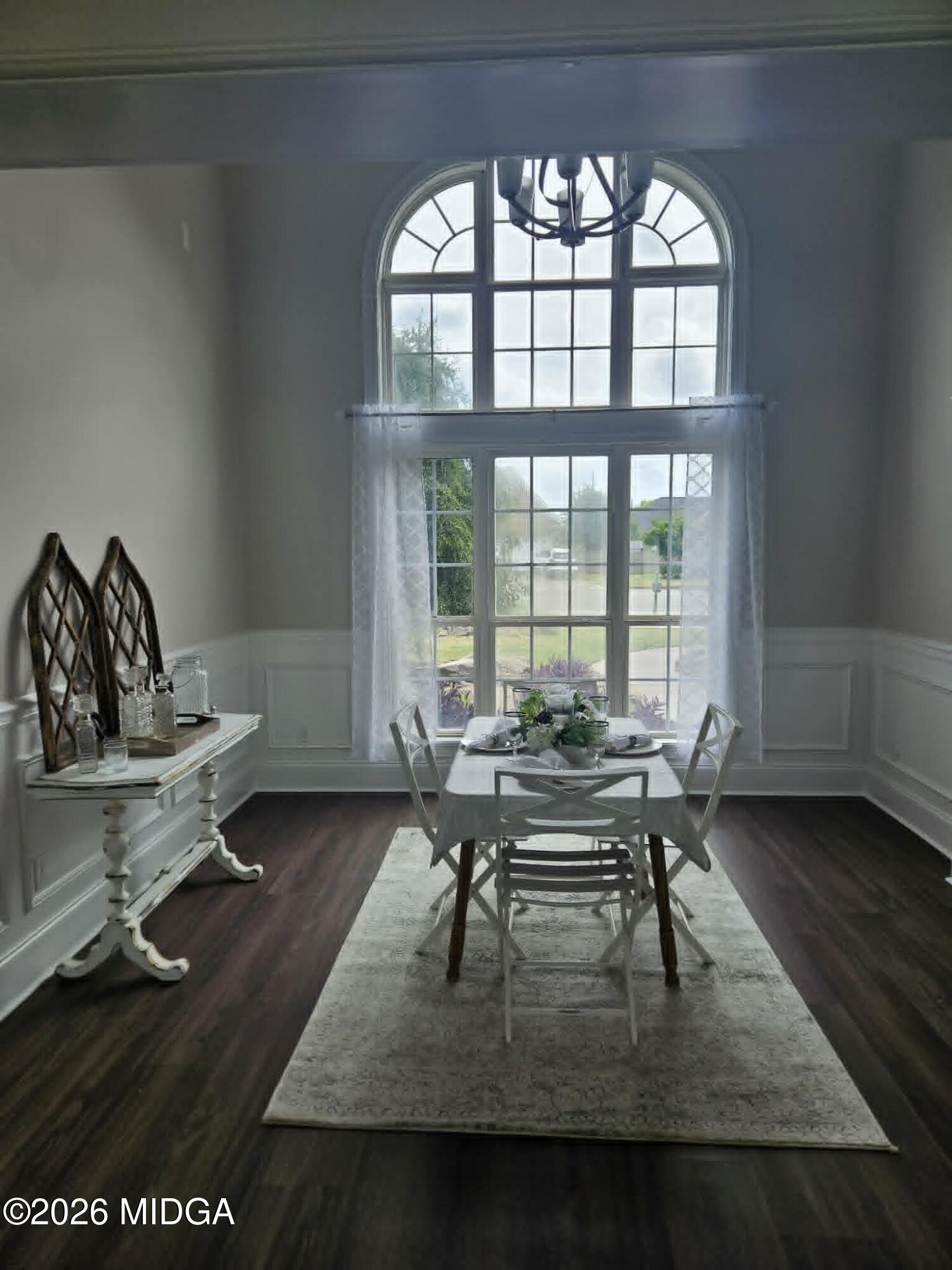 214 Tivoli Park Road Centerville, GA 31028 - Photo 9 of 26 a living room with furniture and a large window