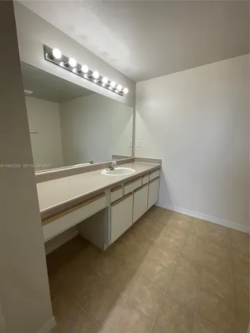 a view of balcony with wooden floor