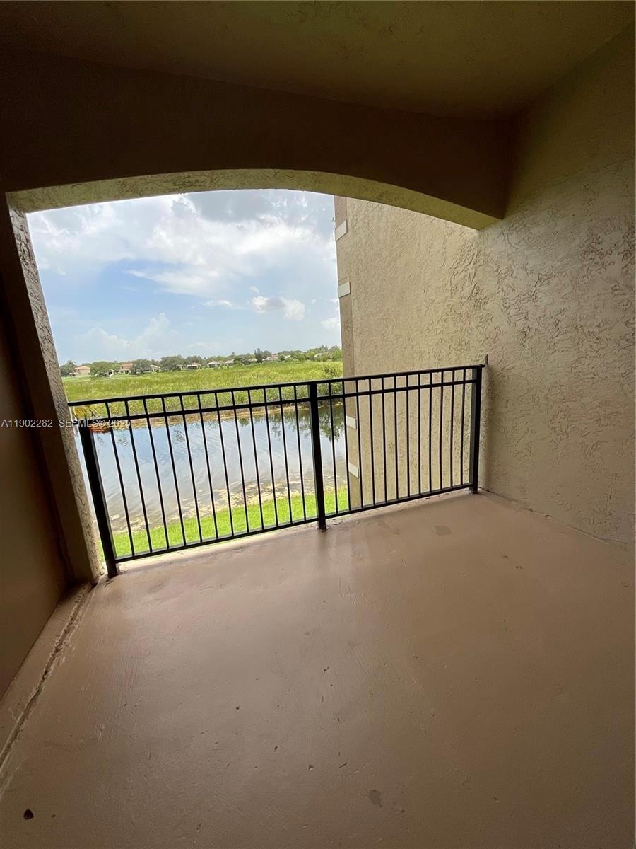 11730 Southwest 2nd Street, Unit 12202 Pembroke Pines, FL 33025 - Photo 18 of 18 a view of balcony with furniture