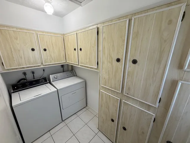 a view of walk in closet with window