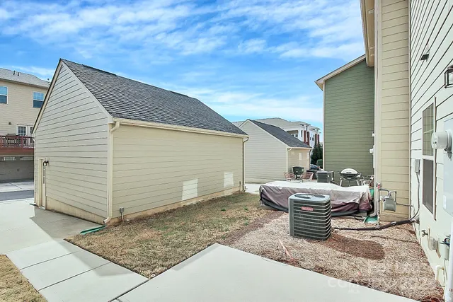 a view of a house with outdoor space and sitting area