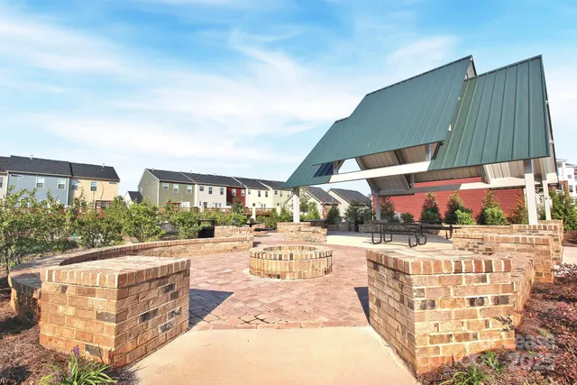 a view of house with yard outdoor seating and entertaining space