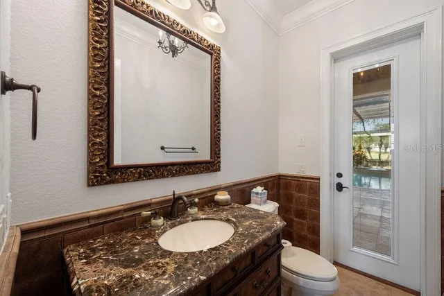 a view of a golf course with a big yard