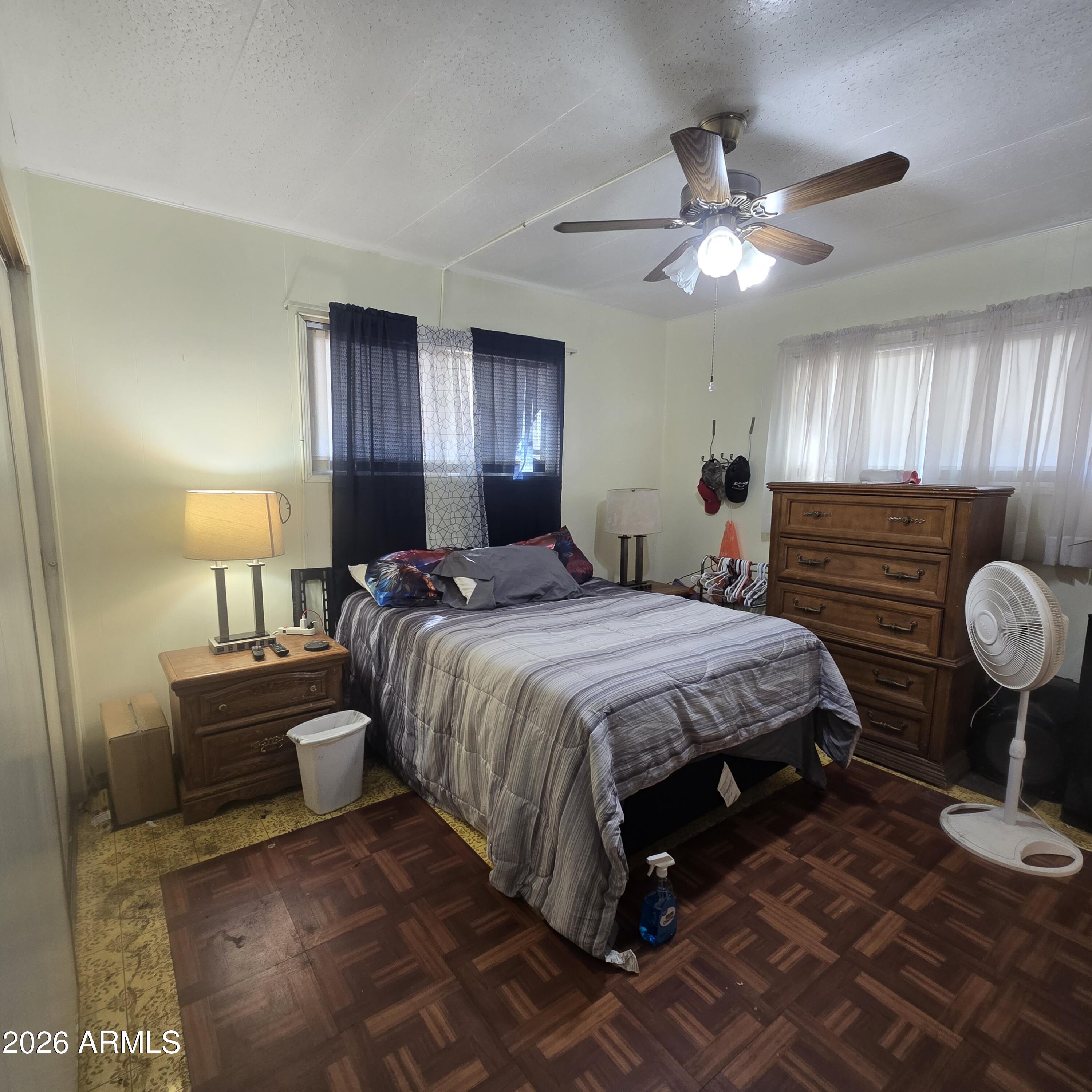 4800 West Ocotillo Road, Unit 154 Glendale, AZ 85301 - Photo 18 of 41 a bedroom with a bed and window