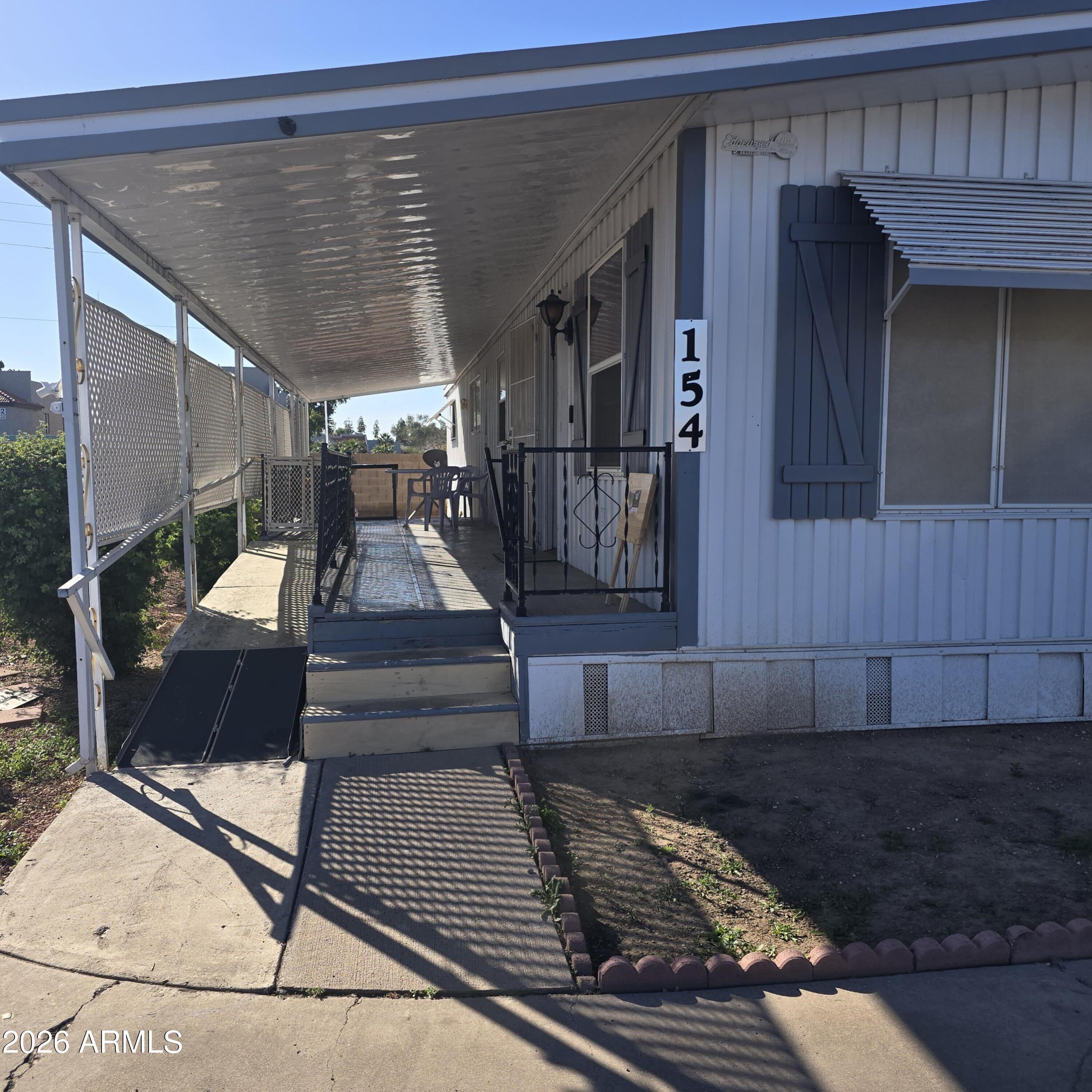 4800 West Ocotillo Road, Unit 154 Glendale, AZ 85301 - Photo 2 of 41 a view of entryway with wooden floor