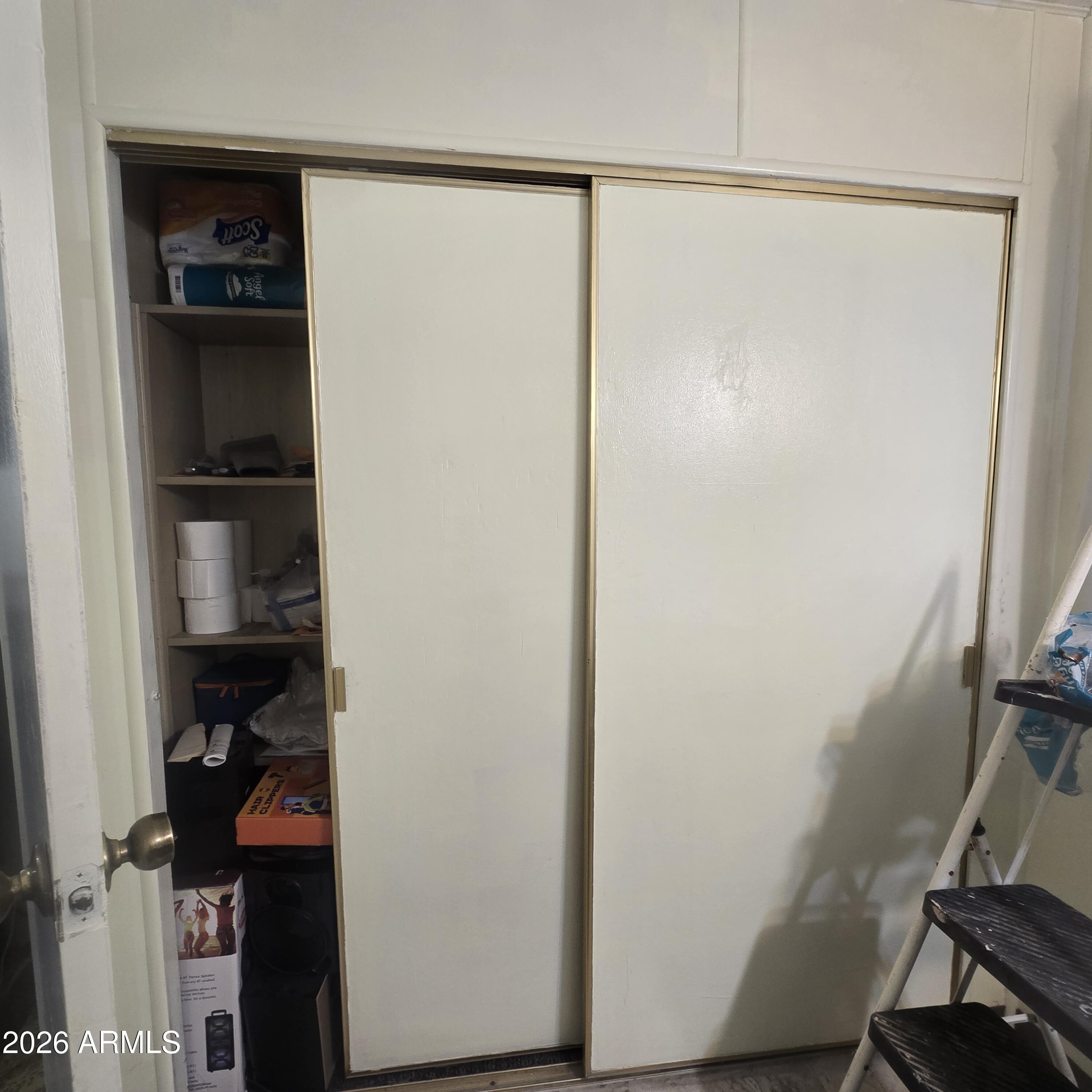 4800 West Ocotillo Road, Unit 154 Glendale, AZ 85301 - Photo 24 of 41 a view of walk in closet with clothes
